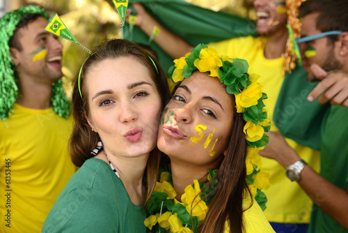 Photo: Brazilian girls soccer fans commemorating victory. Brazilian girls soccer fans commemorating victory.