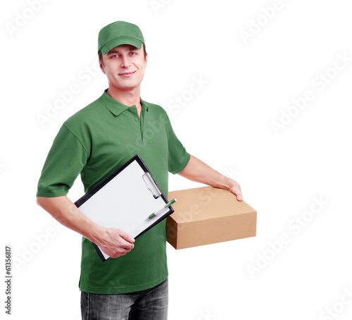 Photo: Express delivery courier in green uniform Express delivery courier in green uniform