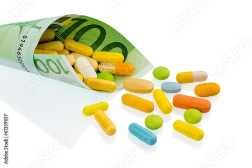 Photo: Tabletten und Einhundert Euroschein Tabletten und Einhundert Euroschein