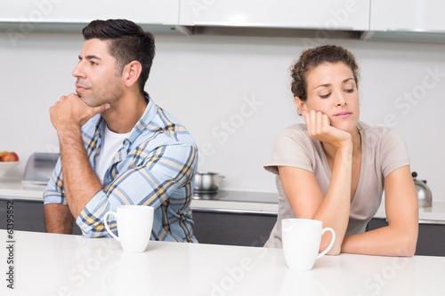 Photo: Unhappy couple having coffee not talking Unhappy couple having coffee not talking