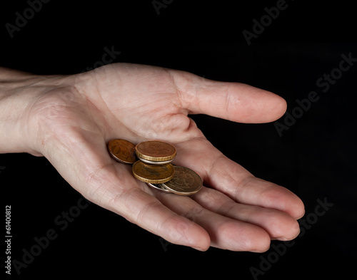 Photo: Hand with coins Hand with coins