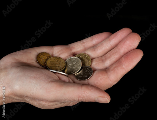 Photo: Hand with coins Hand with coins