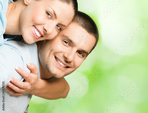 Photo: Portrait of happy couple, outdoors Portrait of happy couple, outdoors
