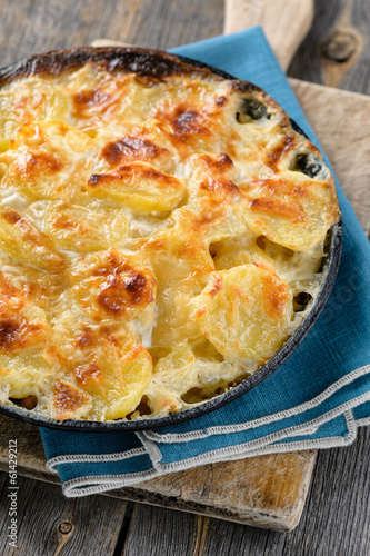 Photo: Potato baked with cream and cheese Potato baked with cream and cheese