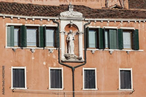Photo: Fragment of the old palace in Venice, Italy. Fragment of the old palace in Venice, Italy.