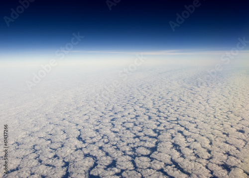 Photo: High altitude view of altocumulus clouds. High altitude view of altocumulus clouds.