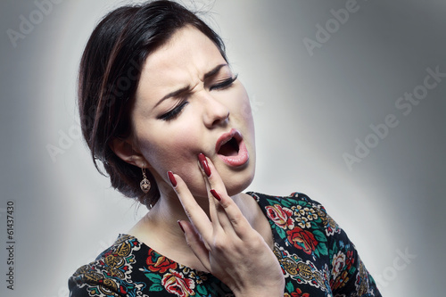 Photo: woman having toothache woman having toothache