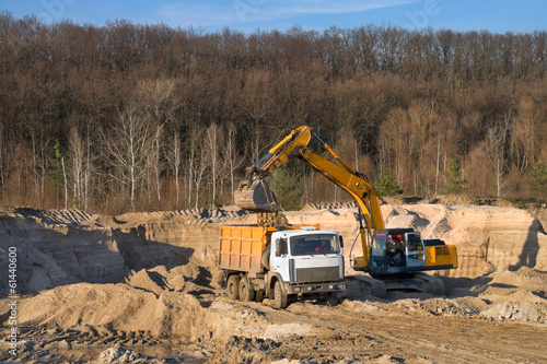 Photo: Loading sand in the sand pit Loading sand in the sand pit