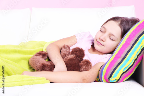 Photo: Beautiful little girl sleeping, close-up Beautiful little girl sleeping, close-up