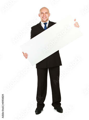 Photo: A business man with an empty blank A business man with an empty blank