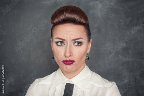 Photo: Beautiful woman with sad expression Beautiful woman with sad expression