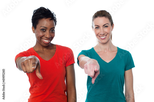 Photo: Smiling friends pointing to you Smiling friends pointing to you