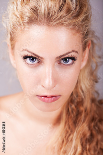 Portrait Of Beautiful Blonde Hair Girl With Grey Eyes By
