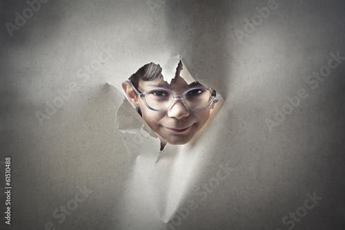 Photo: kid through paper kid through paper