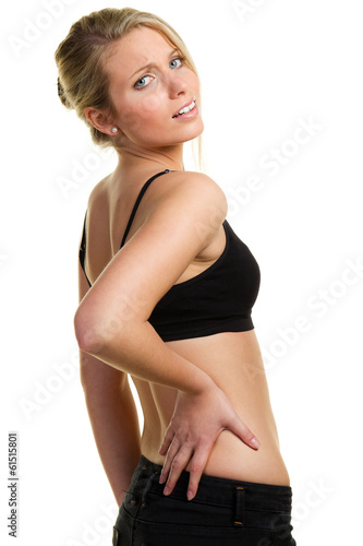 Photo: young womn with back ache young womn with back ache