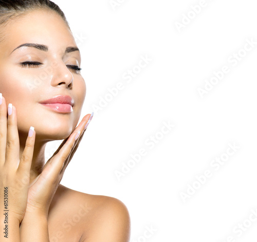 Photo: Beauty Spa Woman Portrait. Beautiful Girl Touching her Face Beauty Spa Woman Portrait. Beautiful Girl Touching her Face