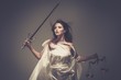 Femida, Goddess of Justice, with scales and sword Femida, Goddess of Justice, with scales and sword