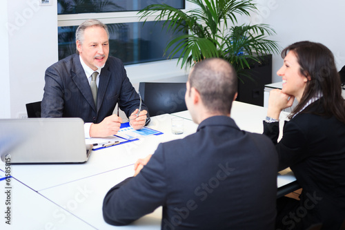 Photo: Business people at work Business people at work
