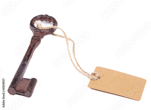 Photo: Key with empty tag, isolated on white Key with empty tag, isolated on white
