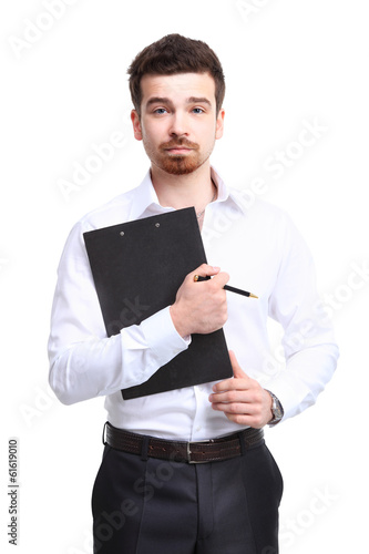 Photo: Portrait of cheerful businessman making notes Portrait of cheerful businessman making notes