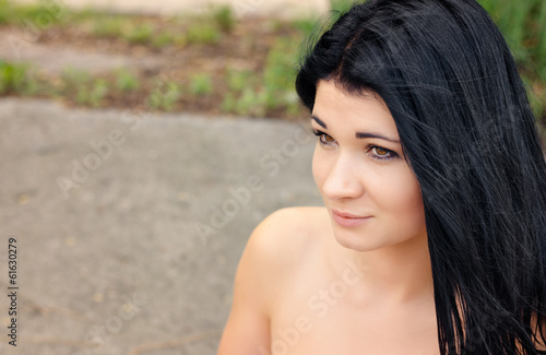 Photo: Beautiful young woman with bare shoulders Beautiful young woman with bare shoulders