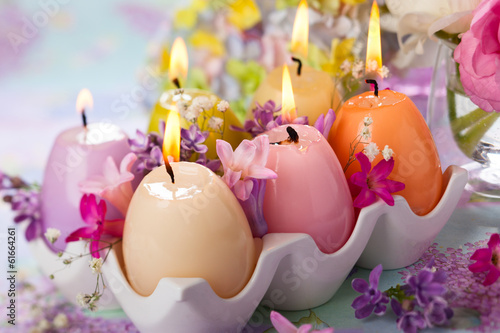Photo: Easter candles and flowers Easter candles and flowers