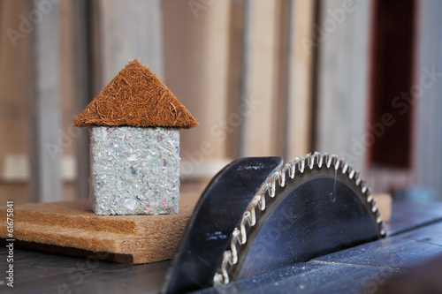 Photo: natural materials for thermal insulation and circular saw natural materials for thermal insulation and circular saw