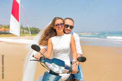 Photo: bride and groom on a motorcycle bride and groom on a motorcycle