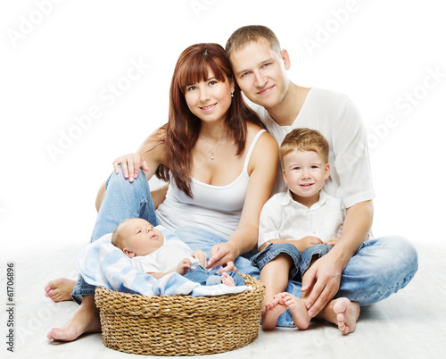 Photo: Young family four persons, smiling father mother two children Young family four persons, smiling father mother two children