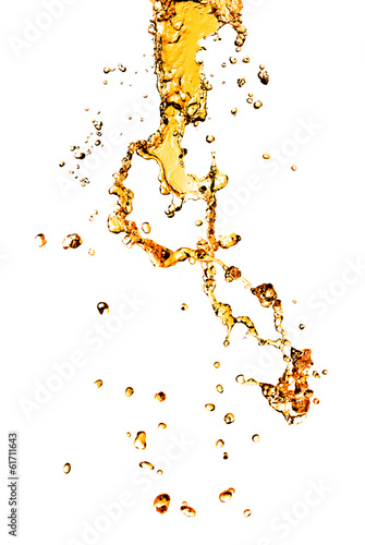 Photo: orange water splash isolated on white orange water splash isolated on white