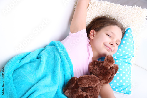 Photo: Beautiful little girl sleeping, close-up Beautiful little girl sleeping, close-up