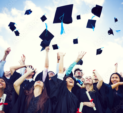 Photo: Graduation Caps Thrown in the Air Graduation Caps Thrown in the Air
