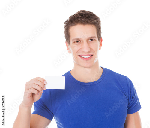 Photo: Young Man Holding Blank Visiting Card Young Man Holding Blank Visiting Card