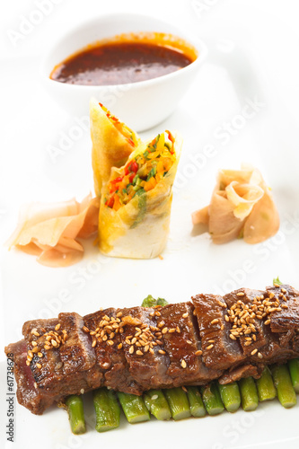 Photo: Grilled beef on asparagus spears Grilled beef on asparagus spears