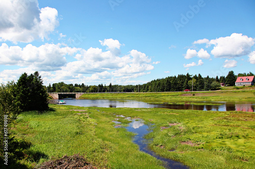 Photo: farm marshes by barn farm marshes by barn