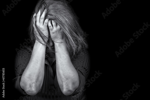 Photo: Young woman crying depression violence Young woman crying depression violence