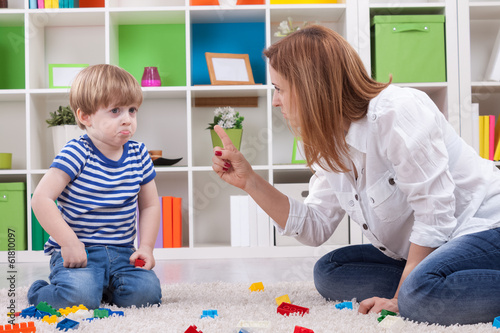 Photo: Angry mother scolding a disobedient child Angry mother scolding a disobedient child
