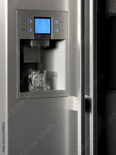 Photo: Refrigerator control display and ice dispenser with glass Refrigerator control display and ice dispenser with glass