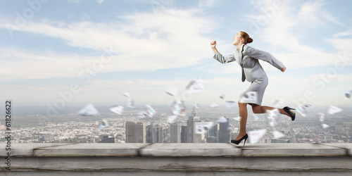Photo: Running businesswoman Running businesswoman