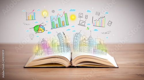 Photo: drawing of a business scheme on an opened book drawing of a business scheme on an opened book
