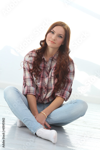 Photo: Beautiful girl on the floor Beautiful girl on the floor
