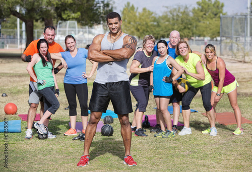 Photo: Confident Instructor with Fitness Class Confident Instructor with Fitness Class