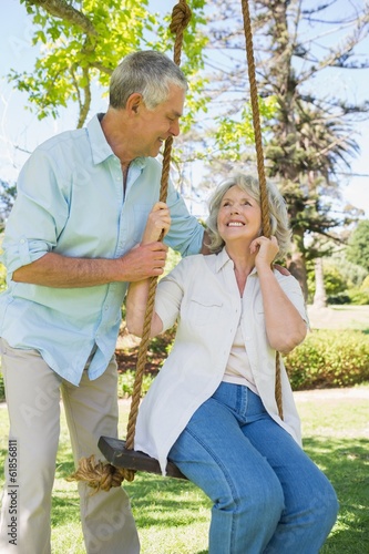Photo: Loving mature couple at park Loving mature couple at park