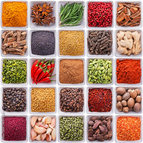 Photo: collection of spices and herbs in ceramic bowls collection of spices and herbs in ceramic bowls