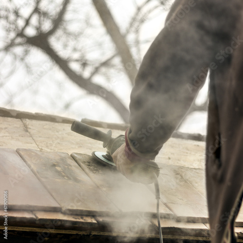 Photo: Roofer - Sanding Roof Tiles Roofer - Sanding Roof Tiles