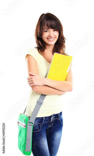 Photo: Nice female student smiling and looking at camera Nice female student smiling and looking at camera