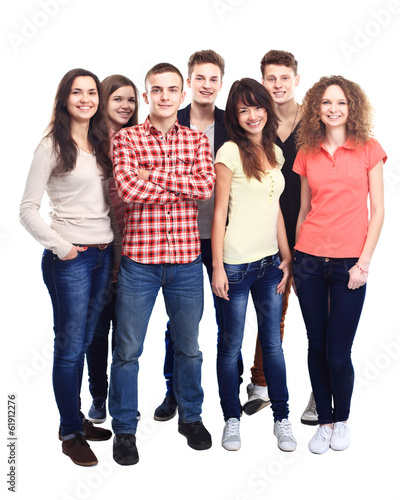 Photo: Casual group of excited friends isolated on white Casual group of excited friends isolated on white