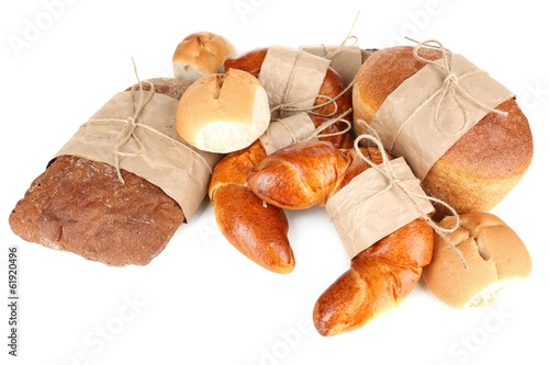 Photo: Different types of bread isolated on white Different types of bread isolated on white