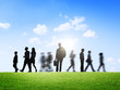 Silhouette of Business People in Motion on a Brand New Day Silhouette of Business People in Motion on a Brand New Day
