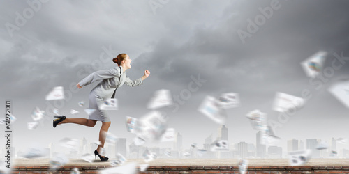 Photo: Running businesswoman Running businesswoman